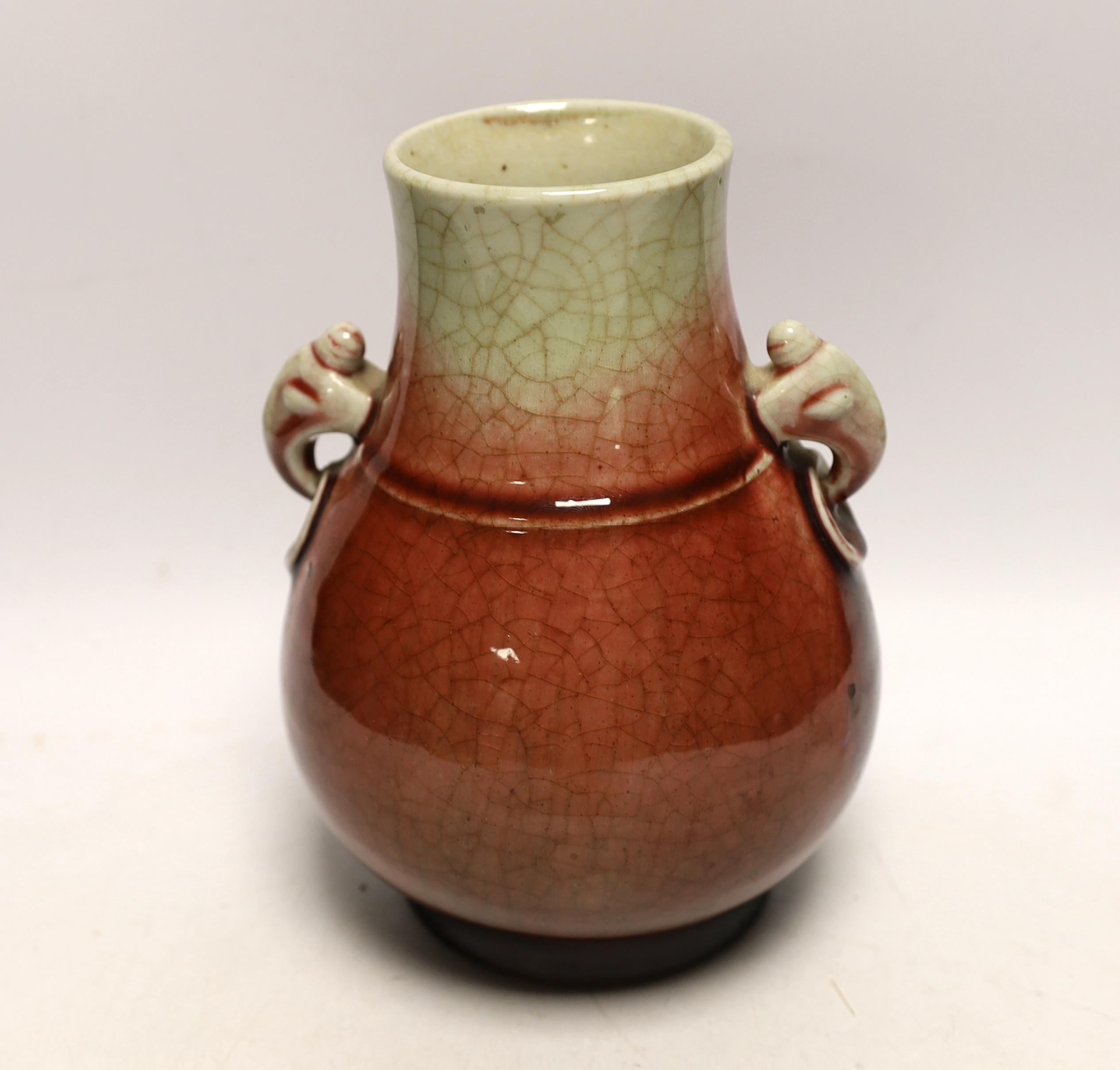A Chinese sang de boeuf glazed pear-shaped vase, hu, late 19th/early 20th century, 21cm